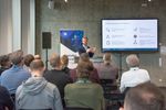 Martin Westerkamp hält seinen Vortrag vor dem Publikum. Der Vortragstitel: "Die Europäische Business Wallet – Der Enabler für die digitalisierte Wirtschaft im EU-Binnenmarkt"
